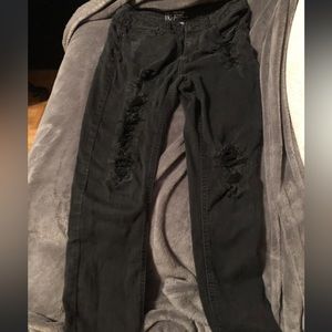 Black holey skinny jeans